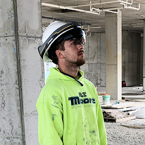 Construction worker wearing augmented reality headwear